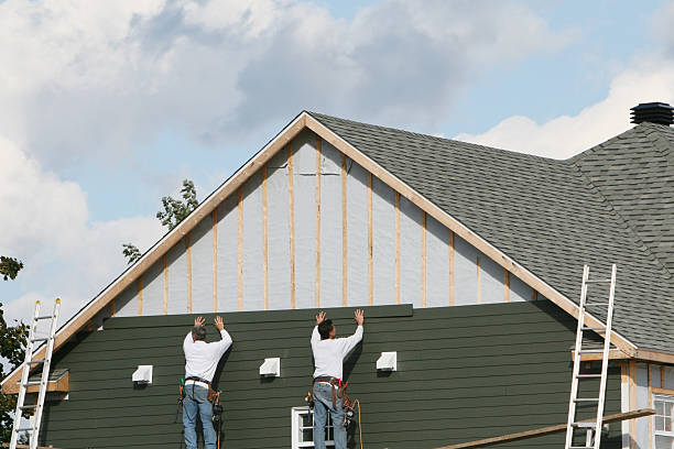 Professional Wood Siding technician working in Hyde Park, MA